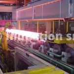 Induction heating plants for hot rolling mills