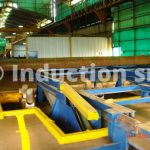 Loading and unloading tables for induction heating plants