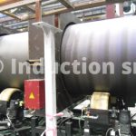 Induction plant for pipes coating