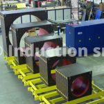 Induction heating plant and coils set for tubes industry