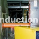 Induction heating plant for tubes heat treatment